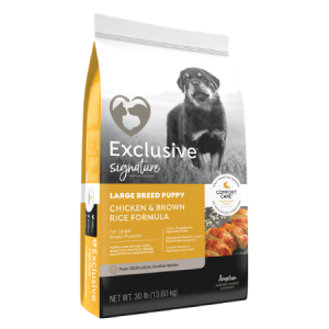Exclusive Signature Large Breed Puppy Food in yellow and grey bag with dog