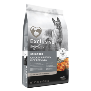 Exclusive Signature Senior Chicken & Brown Rice Formula Dog Food in grey and black bag with dog